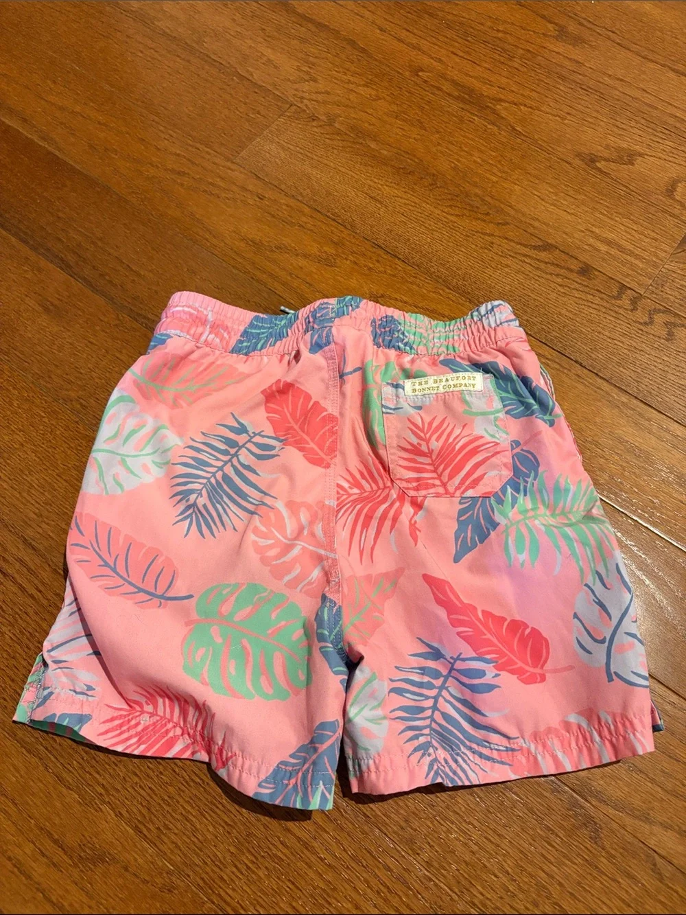 Kids Pink Tropical Leaf Swim Shorts